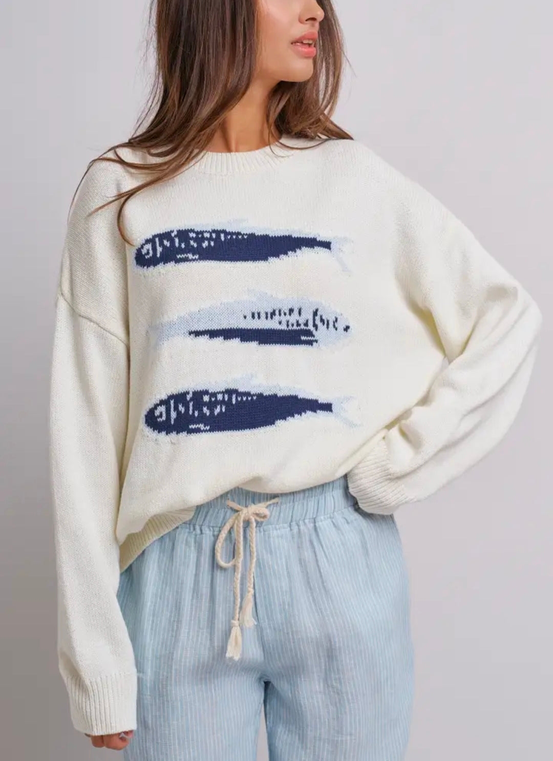 Sardine Oversized Drop-Shoulder Knit
Graphic Sweater