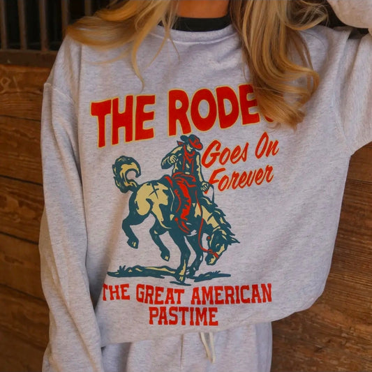 "THE RODEO GOES ON FOREVER" Cozy Sweatshirt