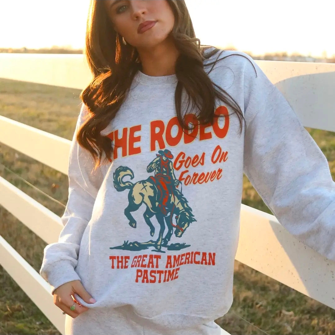 "THE RODEO GOES ON FOREVER" Cozy Sweatshirt