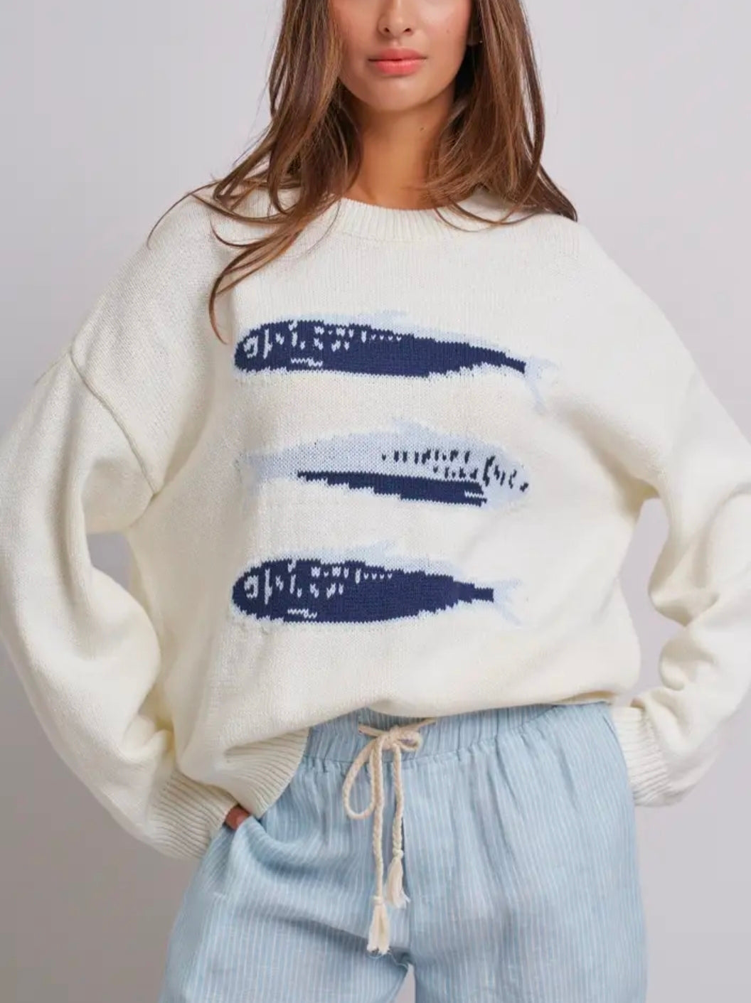 Sardine Oversized Drop-Shoulder Knit
Graphic Sweater